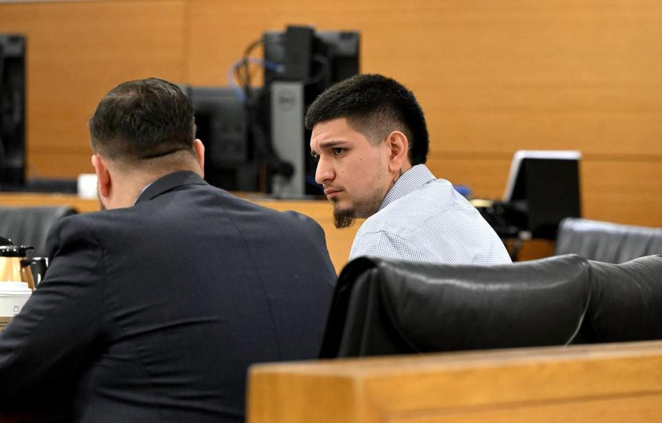 David Consuegra Jr. looks to his attorney, Eric Reisinger as he is the defendant in a joint trial with Jacob Maldonado presided over by Judge Frederick Mercurio at the Manatee County Judicial Center for a 2020 fatal shooting.