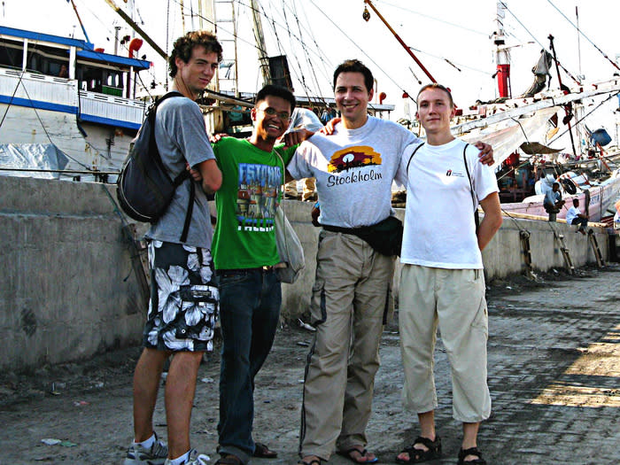 Local input: A Jakartan host escorts his couch surfers to Sunda Kelapa Port during their stay. (