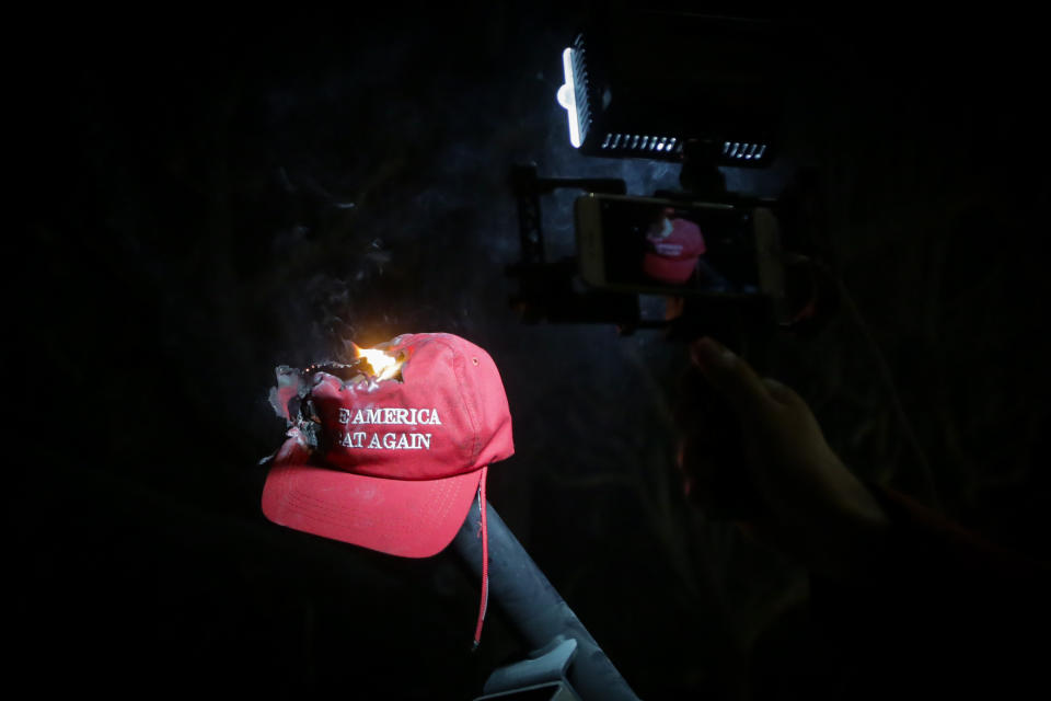 A 'Make America Great Again'' hat is burned on the UC Berkeley campus.&nbsp;