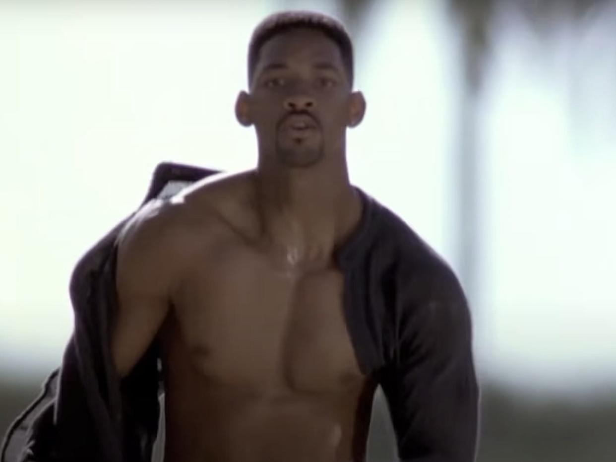 Will Smith wearing an unbuttoned shirt and running in "Bad Boys."