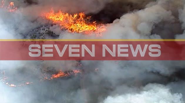 Huge plumes of smoke billow as firefighters battle a fast-moving grass fire in Sydney's west. Photo: 7News