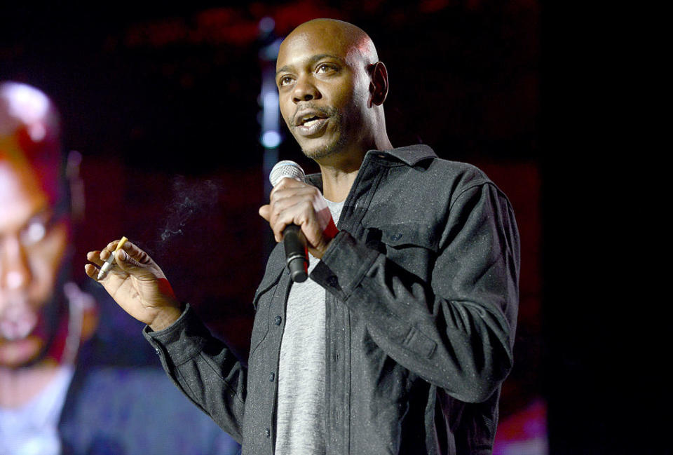 MOUNTAIN VIEW, CA - SEPTEMBER 20: Dave Chappelle performs as part of the The Oddball Comedy & Curiosity Festival at Shoreline Amphitheatre on September 20, 2013 in Mountain View, California. (Photo by Tim Mosenfelder/Getty Images)