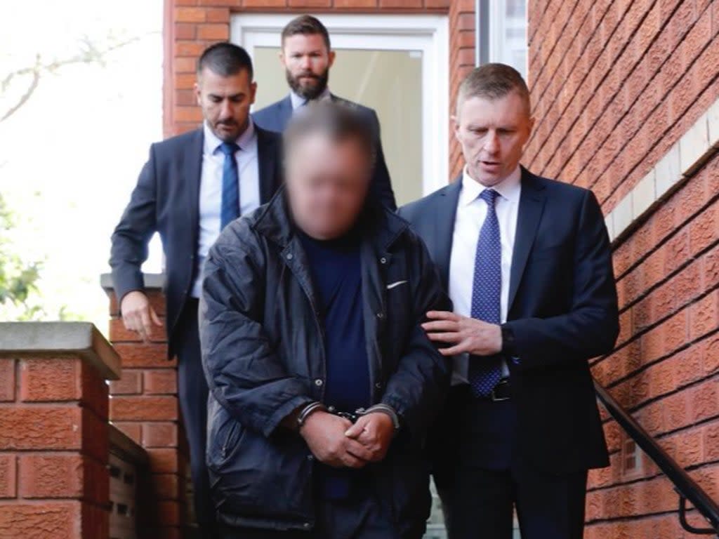 Scott White, 51, during his arrest by New South Wales police in 2020 (New South Wales Police / Twitter)