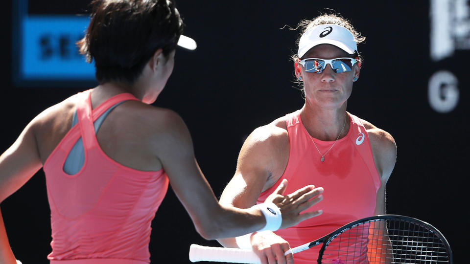 Sam Stosur and Shuai Zhang. (Photo by Mark Kolbe/Getty Images)