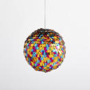 This undated photo shows West Elm's playful Fringe Disco Ball, which is covered in brightly-hued metallic confetti. (West Elm via AP)