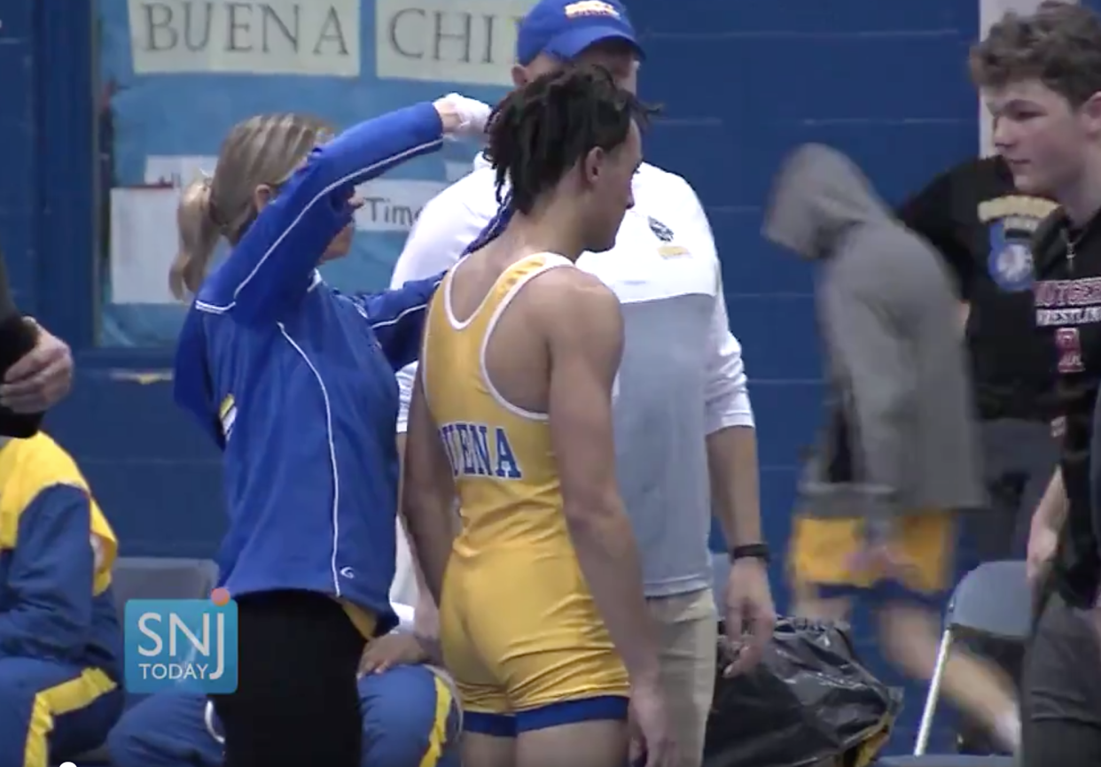 Andrew Johnson’s dreadlocks were cut off so he could compete in his wrestling match. (Photo: Twitter/Mike Frankel/SNJ Today)