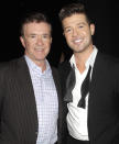 <p>"After my father's death, I remember a friend of his said, 'A big tree has fallen.' That's what my dad was: the big tree," <a href="https://people.com/music/robin-thicke-wants-to-be-as-much-like-late-father-alan-as-possible/" rel="nofollow noopener" target="_blank" data-ylk="slk:Robin told PEOPLE;elm:context_link;itc:0;sec:content-canvas" class="link ">Robin told PEOPLE</a>. "Now here I am, this medium-size tree, and I've got to grow my branches and protect everybody. Every day I try to make him proud of me.</p> <p>"Every time I speak to my son Julian, I feel him because I'm saying the same things he told me," he continued. "When I was young, I wanted to be a rebel because my dad was Mr. Good Guy. Now I just want to be as much like him as possible. In the end, all the advice he gave me was correct."</p>