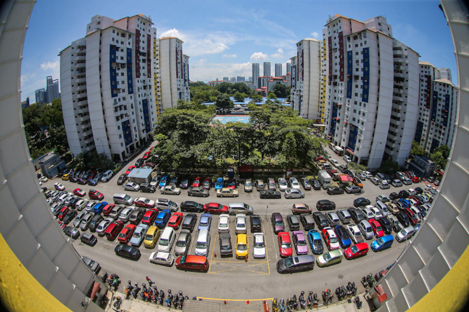 A view of cars in the parking lot at PPR Kerinchi. — Picture by Hari Anggara