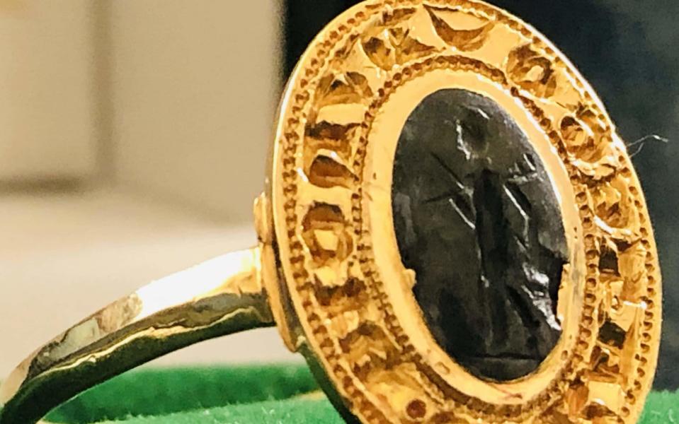 Tom Clark, 81, dug up this rare seal gold ring during a metal detecting session near Aylesbury, Buckinghamshire, in 1979 - Hansons / SWNS