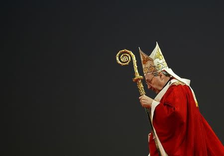 FILE PHOTO - Head of the Catholic Church in Australia Cardinal George Pell leads the World Youth Day opening mass in Sydney July 15, 2008. REUTERS/Daniel Munoz/File Photo