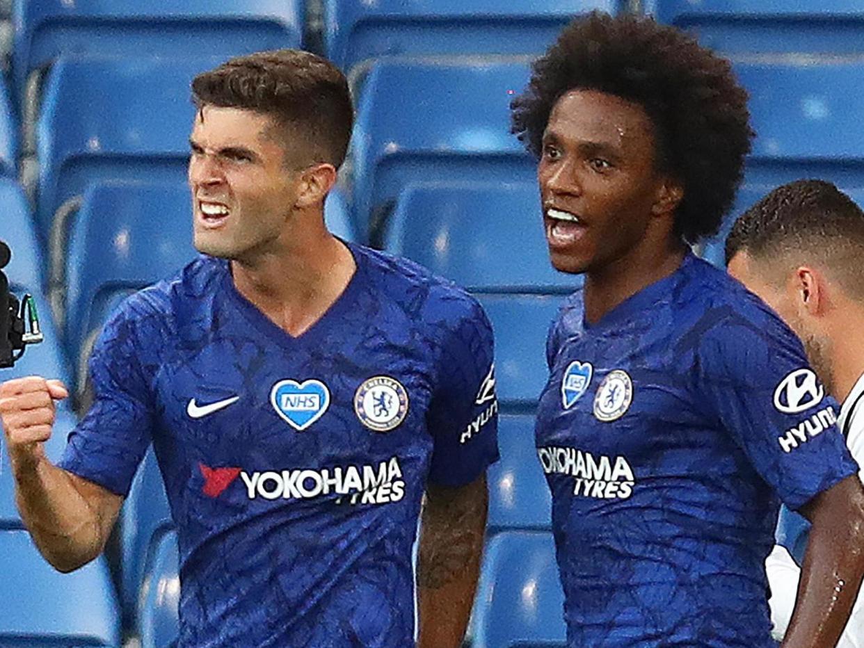 Chelsea's goalscorers Christian Pulisic (left) and Willian celebrate together: POOL/AFP via Getty Images