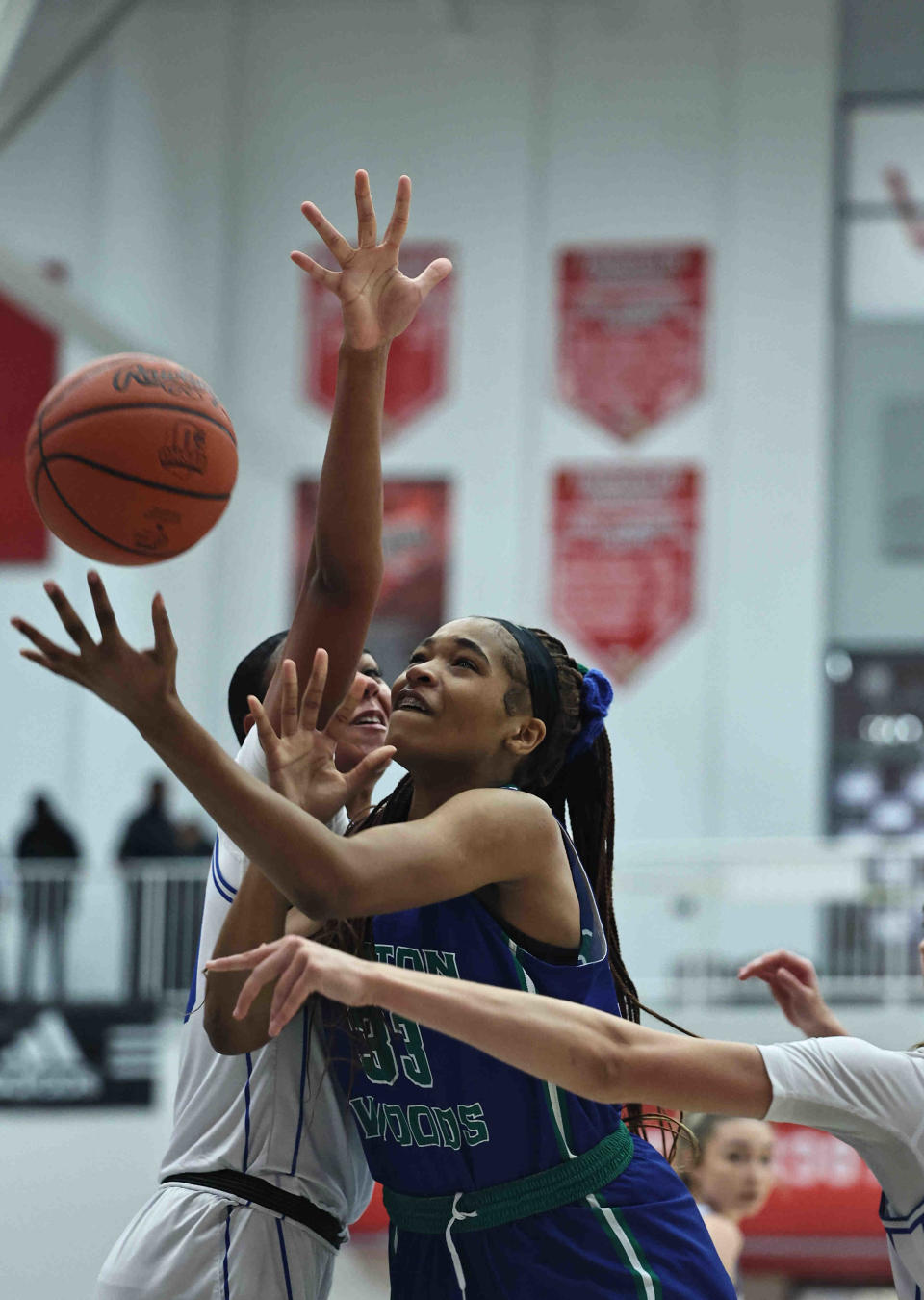 Winton Woods forward Daniah Trammell (33) drives to the basket during the Warriors' district final against Springboro Saturday, March 2, 2024.