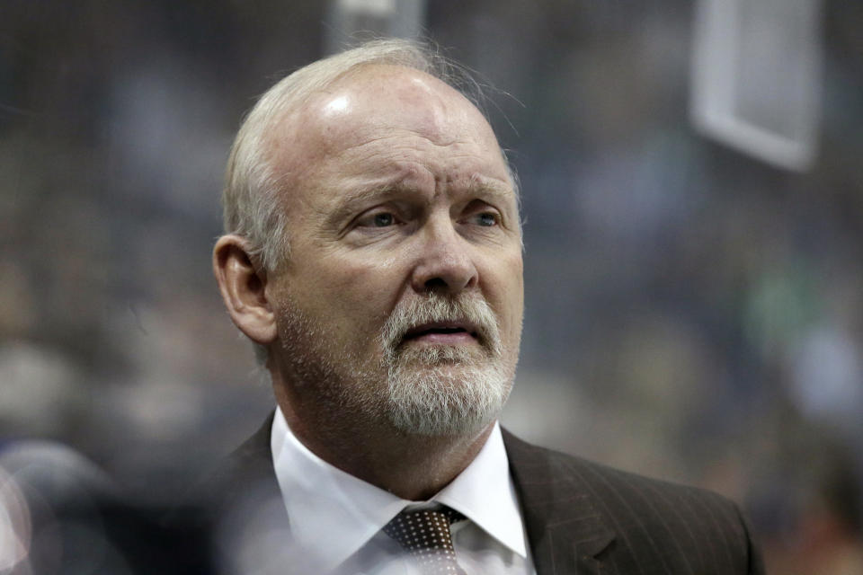 FILE - In this Jan. 14, 2017, file photo, then-Dallas Stars head coach Lindy Ruff watches play against the Minnesota Wild in the first period of an NHL hockey game in Dallas. A person with knowledge of the talks tells The Associated Press that the New Jersey Devils are hiring veteran coach Lindy Ruff to take over one of the NHL’s youngest teams and removing the interim tag off Tom Fitzgerald’s title as general manager. (AP Photo/LM Otero, File)