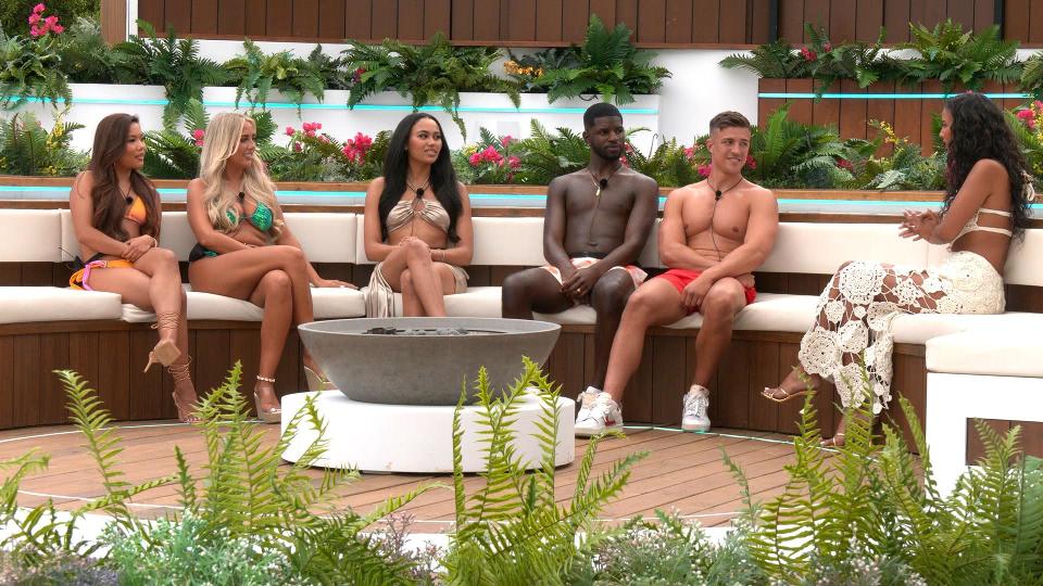 LOVE ISLAND
SERIES 10
TX1
ITV2 AND ITVX

Pictured: ISLANDERS AROUND THE FIREPIT.

This photograph is (C) ITV Plc and can only be reproduced for editorial purposes directly in connection with the programme or event mentioned above, or ITV plc. This photograph must not be manipulated [excluding basic cropping] in a manner which alters the visual appearance of the person photographed deemed detrimental or inappropriate by ITV plc Picture Desk.  This photograph must not be syndicated to any other company, publication or website, or permanently archived, without the express written permission of ITV Picture Desk. Full Terms and conditions are available on the website www.itv.com/presscentre/itvpictures/terms

For further information please contact:
James.hildr@itv.com