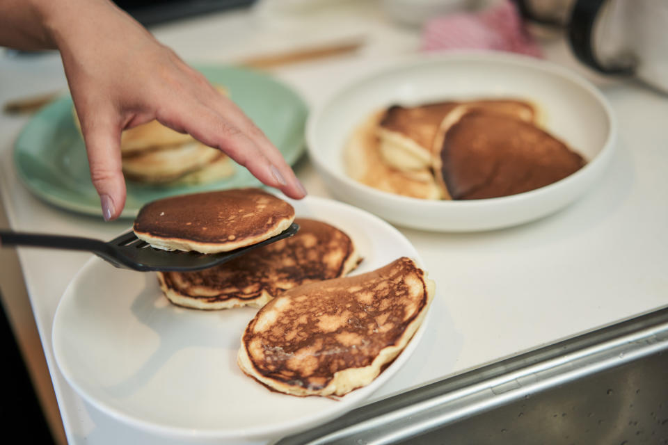 A person making pancakes