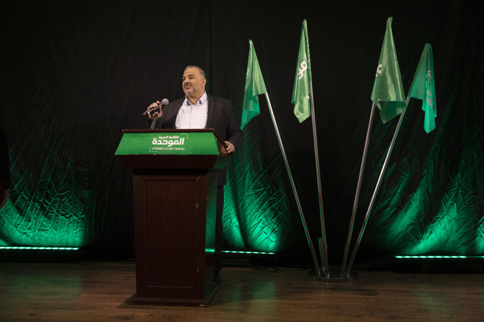 Mansour Abbas, leader of the United Arab List, also known by the Hebrew name Ra'am delivers a statement in Nazareth, Israel, Thursday, April 1, 2021. (AP Photo/Ariel Schalit)