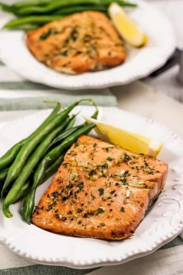 <p>Everyday Family Cooking</p><p>A delicious air fryer salmon dish cooked with the skin on and covered with a simple garlic butter sauce with no breading. It can be cooked fresh and frozen.</p><p><strong>Get the recipe: <a href="https://www.everydayfamilycooking.com/air-fryer-salmon/" rel="nofollow noopener" target="_blank" data-ylk="slk:Air Fryer Garlic Butter Salmon;elm:context_link;itc:0;sec:content-canvas" class="link ">Air Fryer Garlic Butter Salmon</a></strong></p>