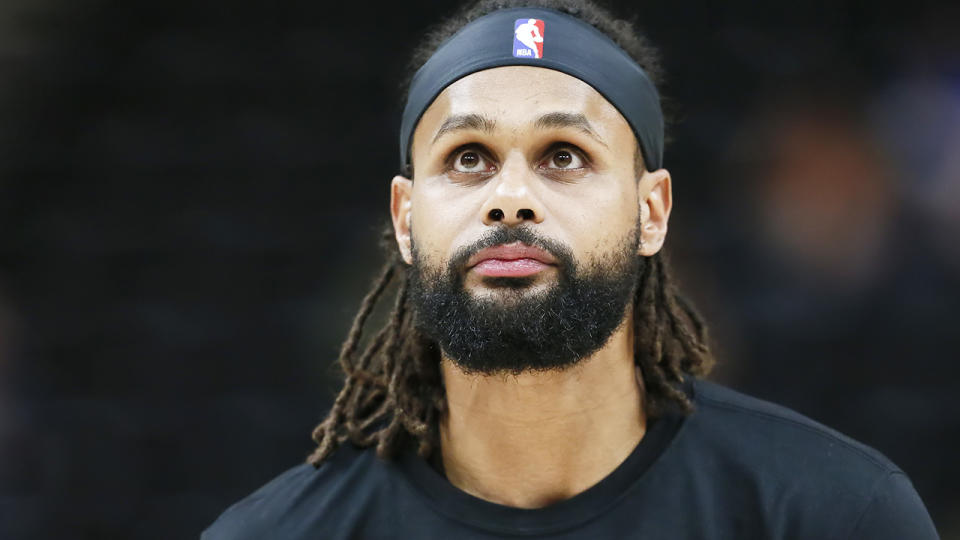 San Antonio Spurs guard Patty Mills is pictured warming up prior to an NBA game.