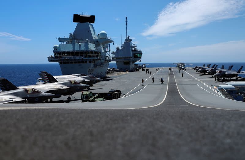 F-35B Lightning II aircrafts are seen on the deck of the HMS Queen Elizabeth aircraft carrier offshore Portugal