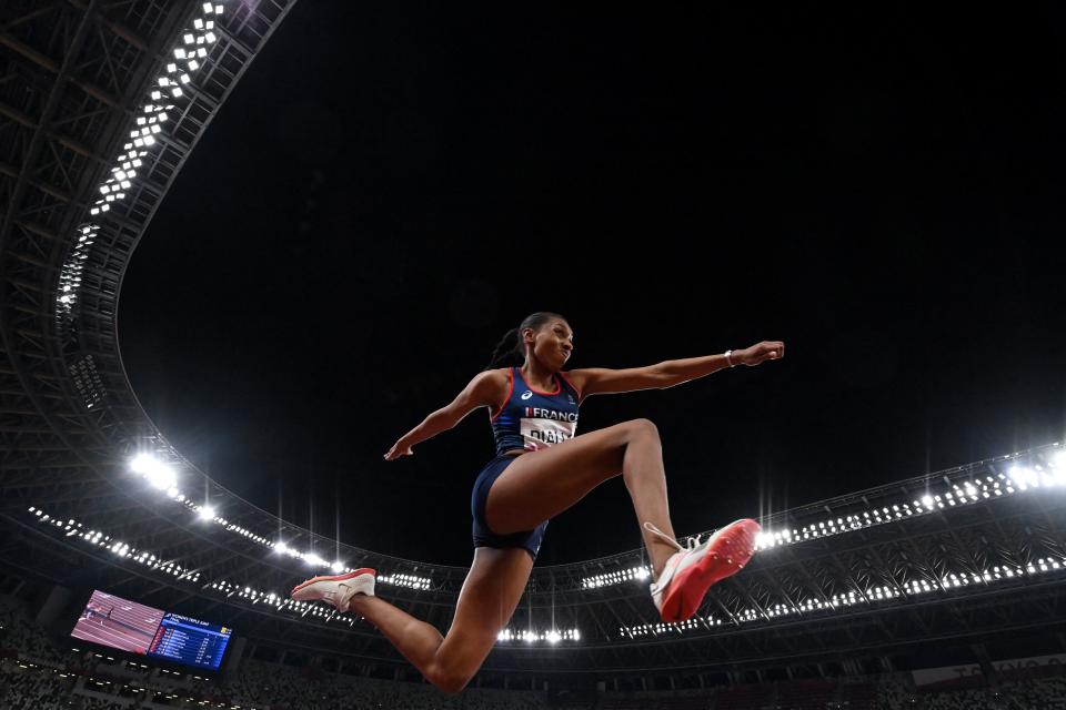 <p>France's Rouguy Diallo competes in the women's triple jump final during the Tokyo 2020 Olympic Games at the Olympic Stadium in Tokyo on August 1, 2021. (Photo by Andrej ISAKOVIC / AFP) (Photo by ANDREJ ISAKOVIC/AFP via Getty Images)</p> 