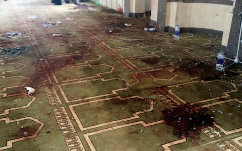 Bloodstained floors at the mosque - Credit: REUTERS/Mohamed Soliman