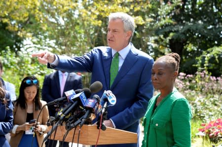 New York City Mayor and former Democratic U.S. Presidential candidate Bill de Blasio speaks at a news conference after announcing that he was ending his presidential bid