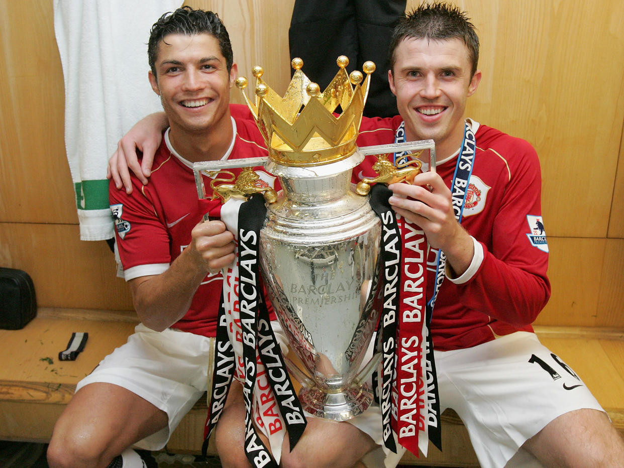 Cristiano Ronaldo and Michael Carrick together after winning the Premiership in 2007: Getty