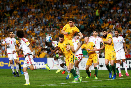 Football Soccer - Australia vs United Arab Emirates - 2018 World Cup Qualifying Asian Zone - Group B - Sydney Football Stadium, Sydney, Australia - 28/3/17 - Australia's Mathew Leckie and Tomi Juric challenges UAE's Ismail al Hammadi. REUTERS/David Gray