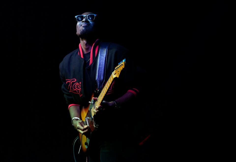 Guitarist Mathias Lattin, 20, performs at the Brooklyn Bowl in Nashville.