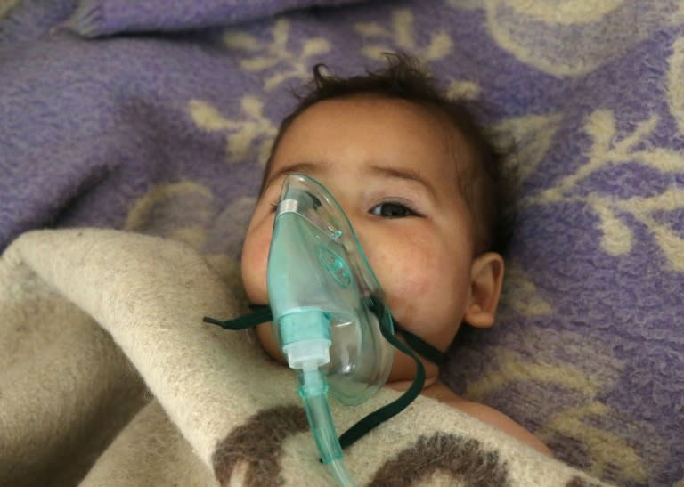 A Syrian child receives treatment near Khan Sheikhun, Syria, in April 2017 following a toxic gas attack that a UN report found had been launched by the Syrian government; a British offical rebuked Russia's motion for a new investigation