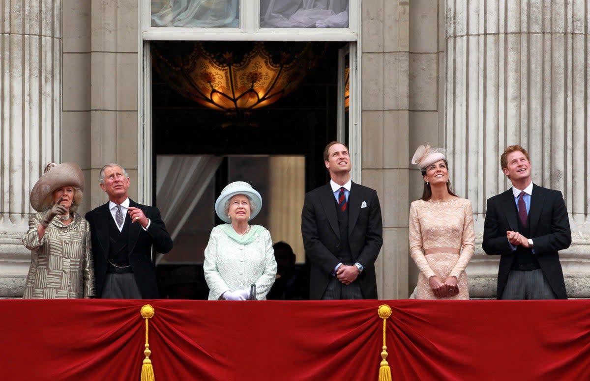 The Duchess of Cornwall, the Prince of Wales, the Queen, the Duke and Duchess of Cambridge and Prince Harry appear on the balcony of Buckingham Palace to watch the flypast during the Diamond Jubilee celebrations (David Davies/PA) (PA Archive)