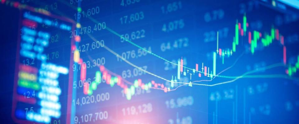 Business graph background: Analysis business accounting on info sheets. Businessman hand working on analyzing investment charts for Gold market, Forex market and Trading market.