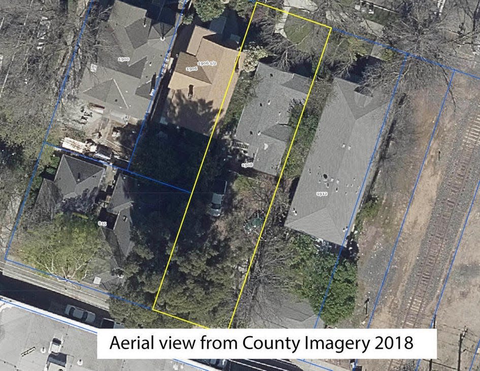 An aerial  image of George Warren's duplex property and its surrounding homes.