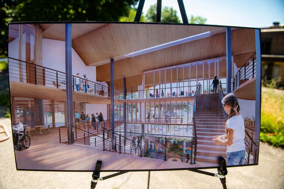 Concept art of YOU stands on display after being unveiled during a press conference for the start of demolition of the YMCA building in the city of Poughkeepsie, NY on Monday, June 6, 2022.