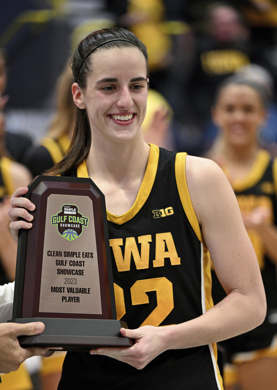 Iowa's Caitlin Clark is named Most Valuable Player after the final game against Kansas State in the NCAA college basketball Gulf Coast Showcase, Sunday, Nov. 26, 2023, in Estero, Fla. (AP Photo/Chris Tilley)