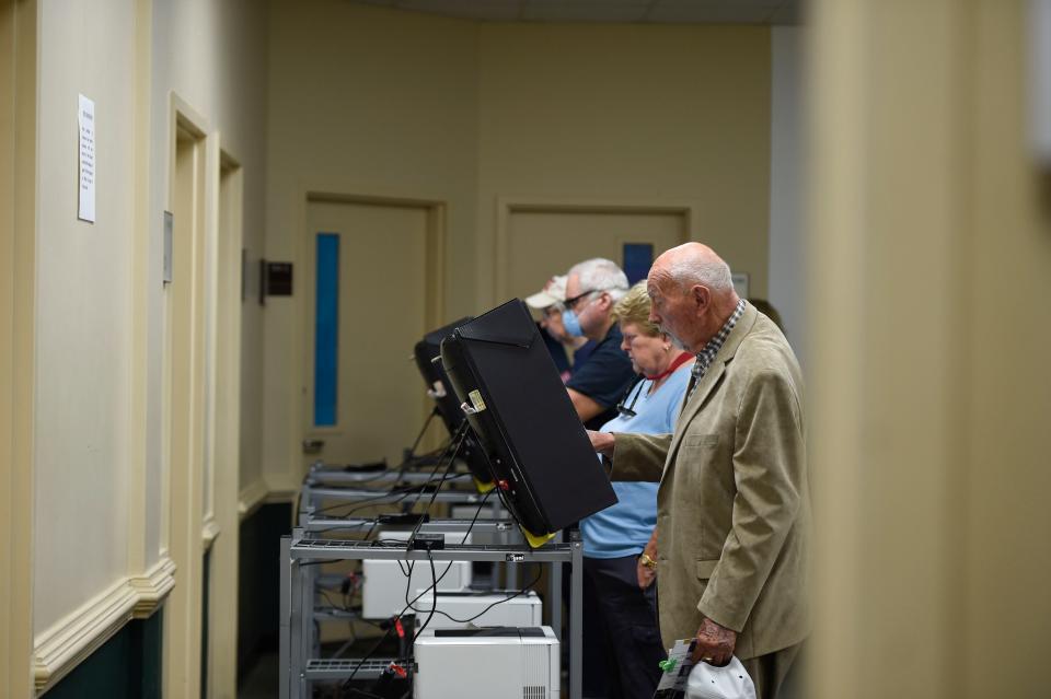 Robert Halvorsen, 92, casts his vote in the Georgia primary election at First Baptist Church of Augusta on Tuesday, May 24, 2022. An Augusta man is challenging the eligibility of 18 registered Richmond County voters.