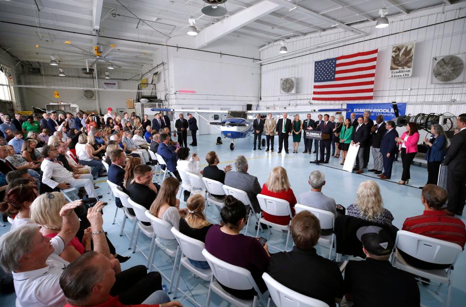 About 200 people crowded an airport hangar at Embry-Riddle Aeronautical University in Daytona Beach on Friday to hear Gov. Ron DeSantis speak.