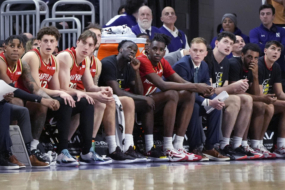 Maryland players on the bench watch during the second half of the team's NCAA college basketball game against Northwestern in Evanston, Ill., Wednesday, Jan. 17, 2024. (AP Photo/Nam Y. Huh)