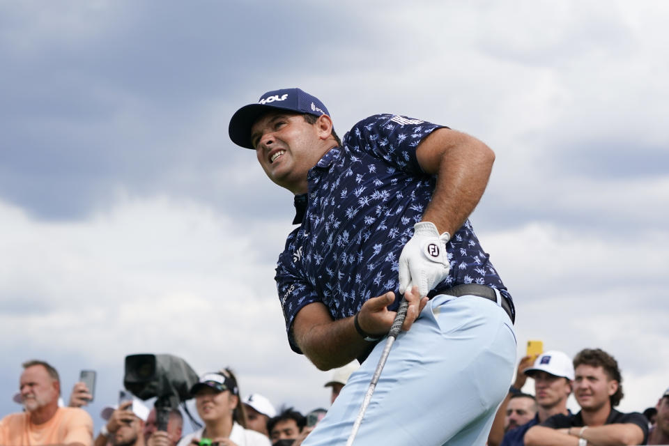 Patrick Reed watches his shot off the 10th tee during the final round of the Bedminster Invitational LIV Golf tournament in Bedminster, N.J., Sunday, July 31, 2022. (AP Photo/Seth Wenig)