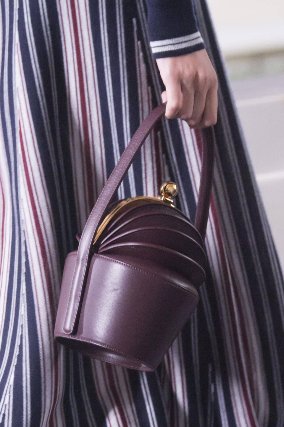 <p><i>Purple leather kiss-lock handbag from the SS18 collection. (Photo: ImaxTree) </i></p>