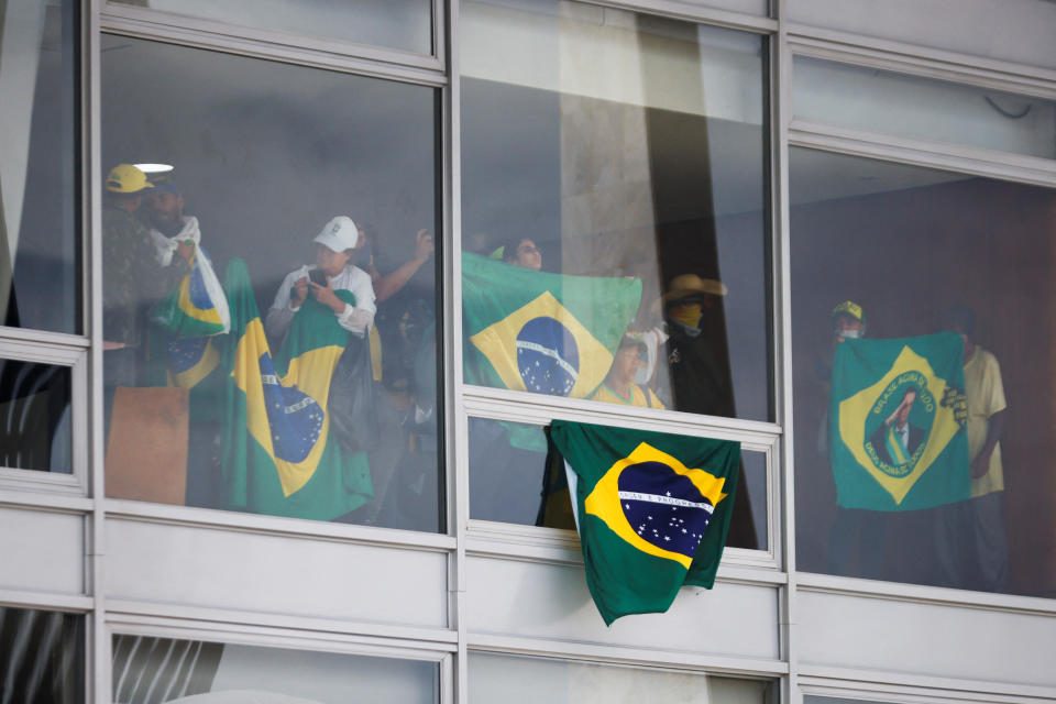 Supporters of Brazil's former President Jair Bolsonaro demonstrate against President Luiz Inacio Lula da Silva, in Brasilia, Brazil, January 8, 2023. REUTERS/Adriano Machado