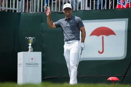 Jun 24, 2018; Cromwell, CT, USA; Paul Casey waves to the crowd before teeing off for the final round of the Travelers Championship at TPC River Highlands. Mandatory Credit: Bill Streicher-USA TODAY Sports