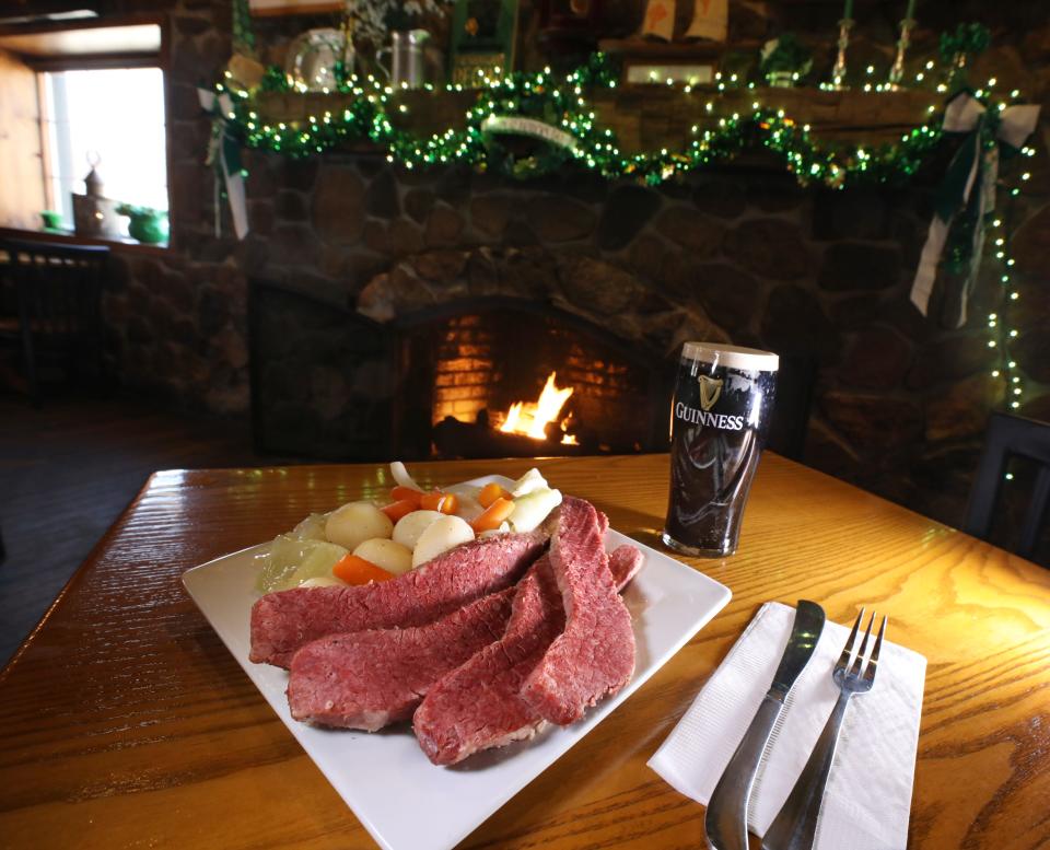 A sit down meal of corned beef and cabbage, a tradition in celebration of St. Patrick's Day.