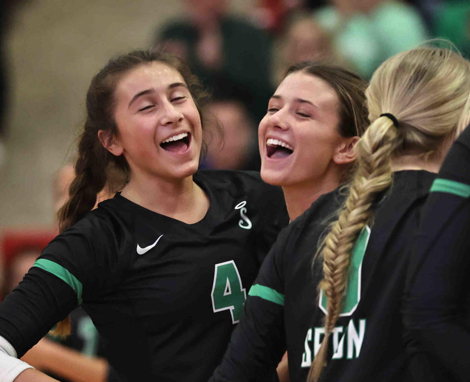 Seton's Callie Combs (4) and Daisy Cluxton (11) during their regional volleyball game against St. Ursula Thursday, Nov. 2, 2023.