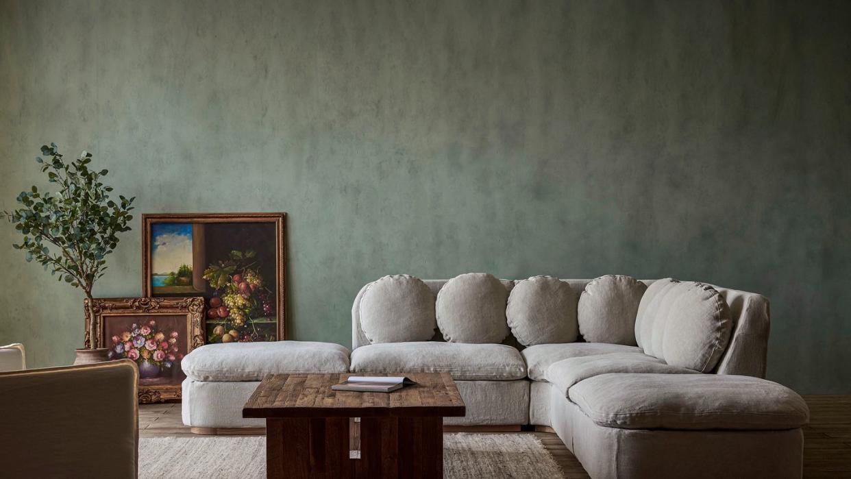 a living room with a couch and coffee table