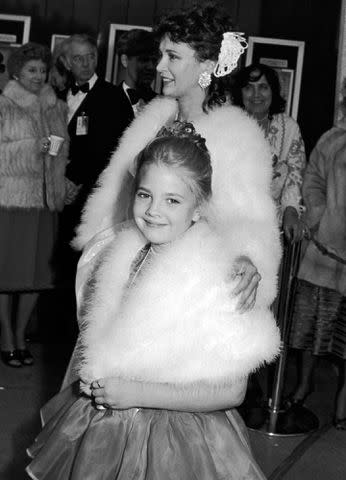 <p>Ron Galella, Ltd./Ron Galella Collection/Getty</p> Drew Barrymore and mother Jaid Barrymore attend 55th Annual Academy Awards on April 11, 1983.