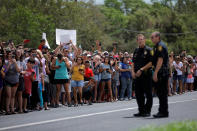 <p>A crowd of people gather outside a fire station where U.S. President Donald Trump received briefing on Tropical Storm Harvey relief efforts in Corpus Christi, Texas, Aug. 29, 2017. (Photo: Carlos Barria/Reuters) </p>