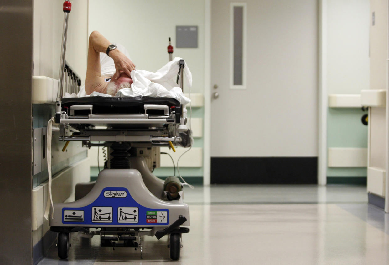 A patient waits in the hallway for a room to open up in the emergency room at Ben Taub General Hospital in Houston, Texas, July 27, 2009. Houston, the fourth-largest American city, is a case study in the extremes of the U.S. healthcare system. 
It boasts the immense medical center that offers top-notch care at its 13 hospitals, but also has a higher ratio of uninsured patients than any major U.S. city: about 30 percent. To match feature USA-HEALTHCARE/TEXAS   REUTERS/Jessica Rinaldi (UNITED STATES SOCIETY HEALTH POLITICS)