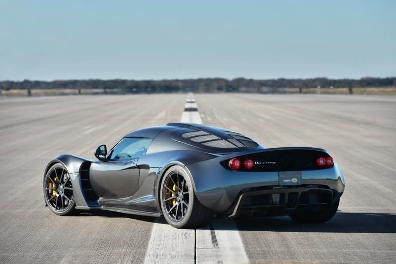 The Hennessey Venom GT parked on the runway formerly used for space shuttle landings at the Kennedy Space Center. 