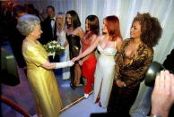 <p>The Queen meets the Spice Girls at the Royal Variety Performance on 1 December 1997. (AFP via Getty Images)</p> 